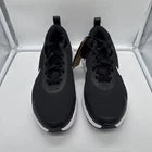 Size 9.5 Women’s- Nike Promina Black White-
