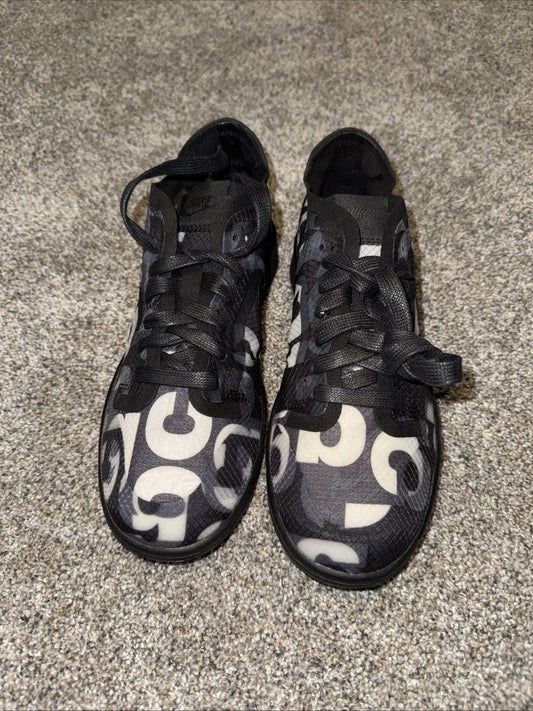 Size 8 Women’s - Comme des Garçons x Nike Dunk Low Monogram Print