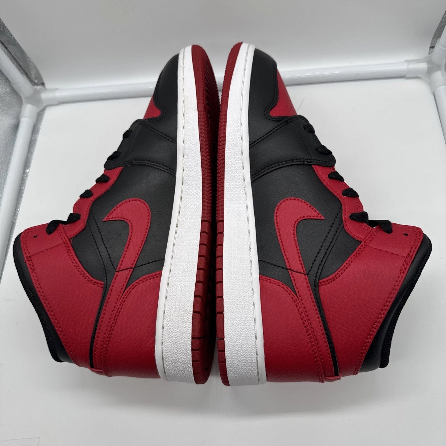 Size 7Y- Jordan 1 Mid Black Red